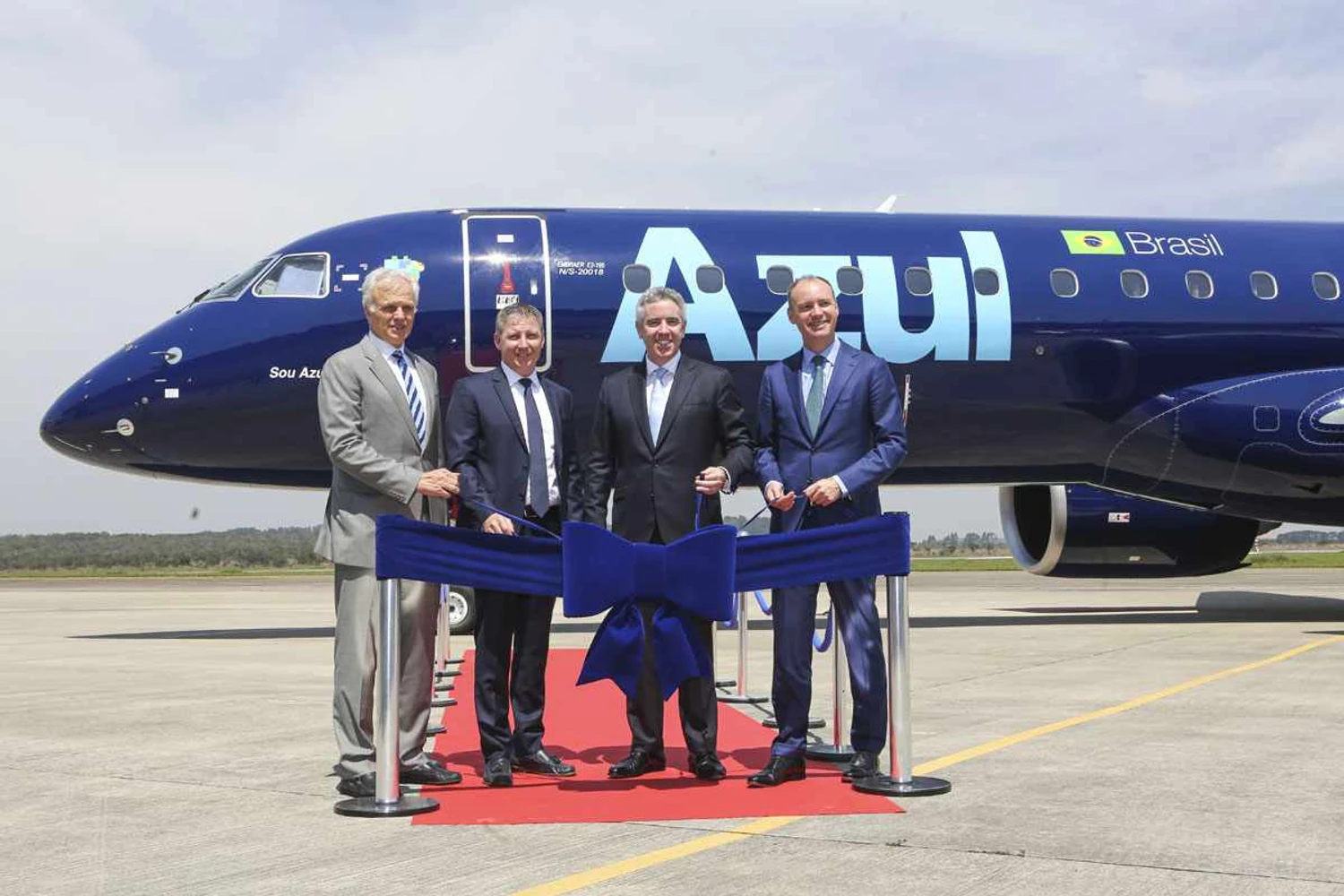 David Neleeman, John Rodgerson, John Slattery e Aengus Kelly (Embraer)