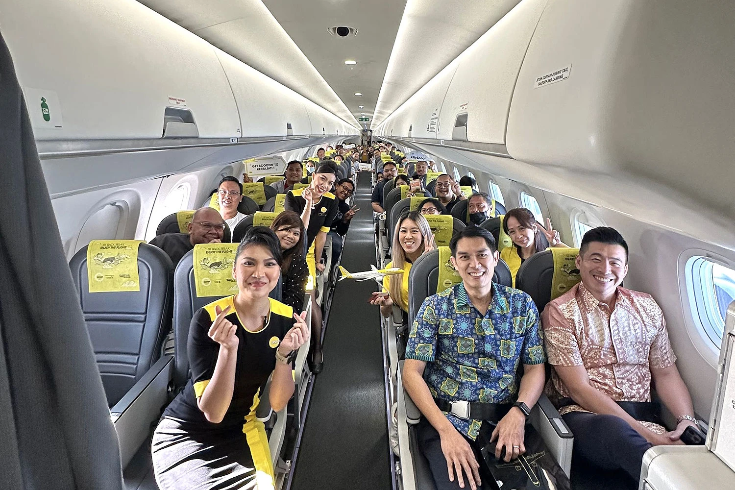 Cabine de passageiros do E190-E2 da Scoot (Scoot)